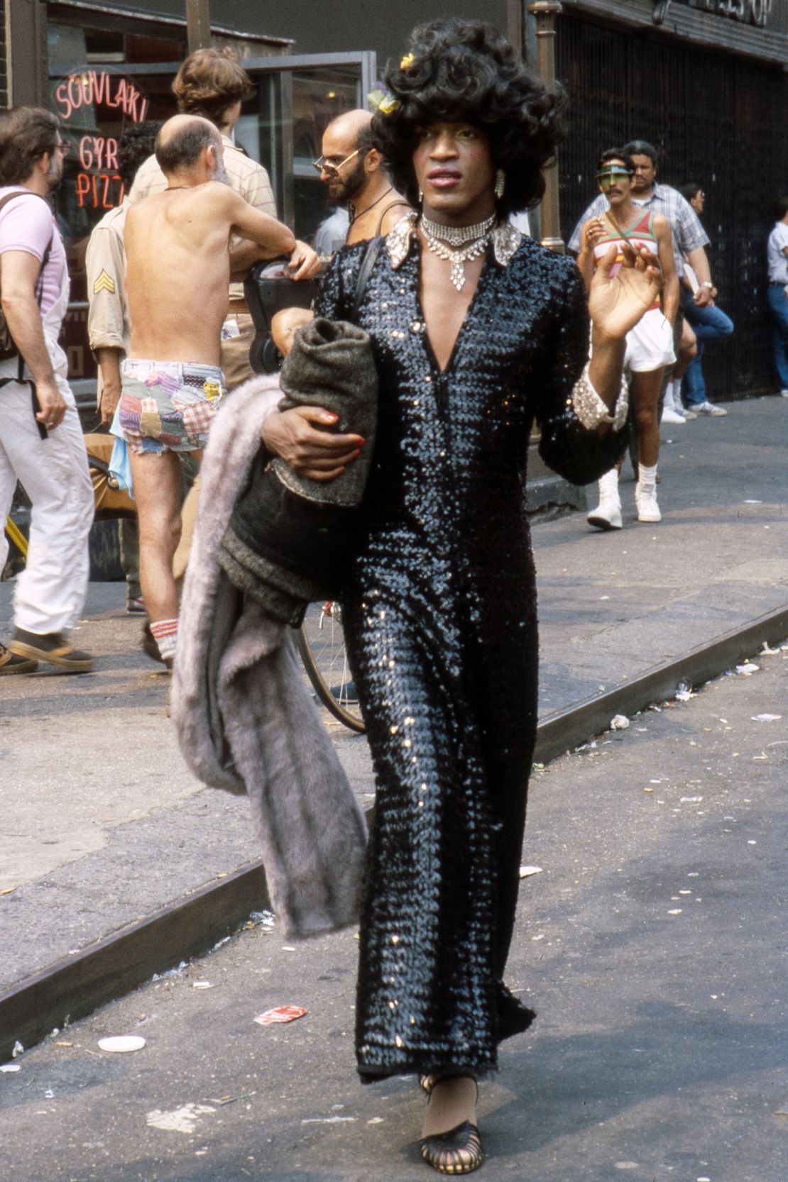 American gay liberation activist Marsha P Johnson (1945 - 1992) on the corner of Christopher Street and 7th Avenue during the Pride March (later the LGBT Pride March), New York, New York, June 27, 1982. (Photo by Barbara Alper/Getty Images)