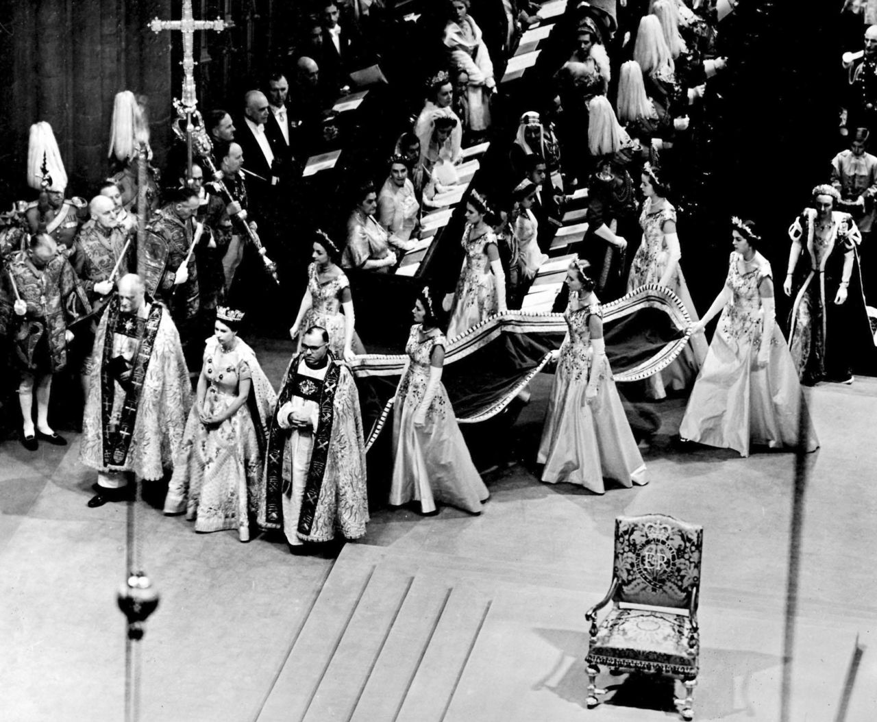 The Queen arrives at Westminster Abbey with her six maids of honor.