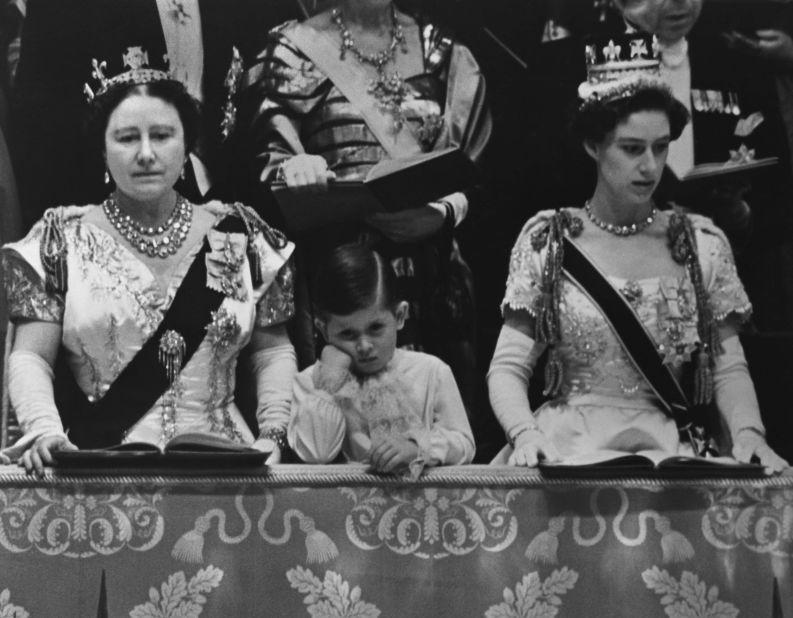 Prince Charles watches his mother's coronation. On the left is his grandmother, the Queen Mother. At right is his aunt, Princess Margaret.