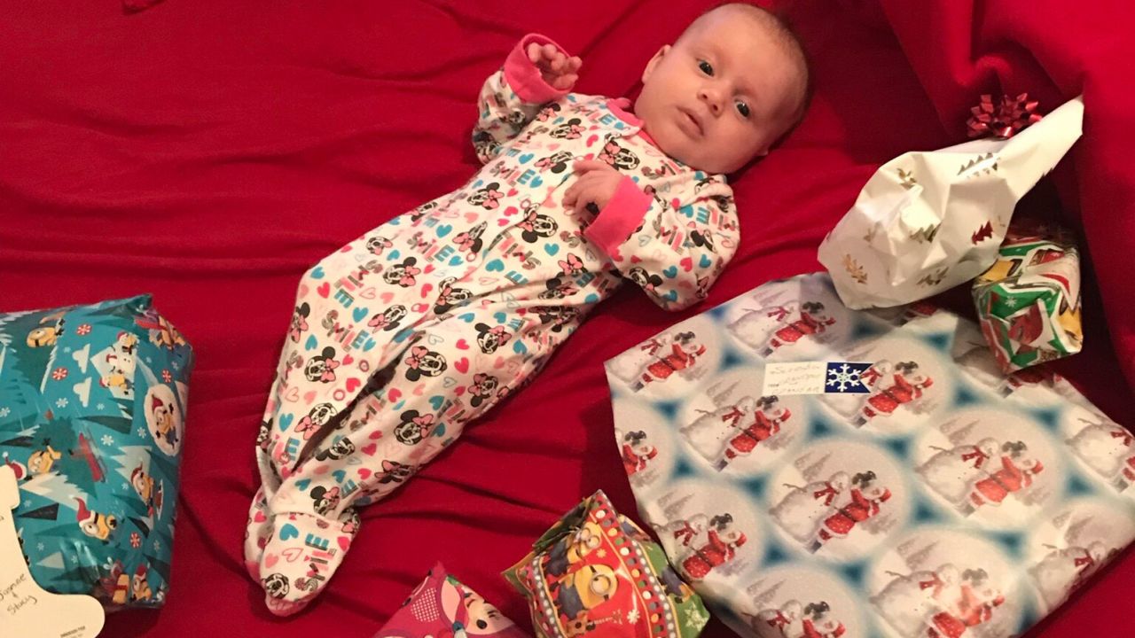 For Seersha's first Christmas, her parents wiped down her gifts and brought them to her bedroom.