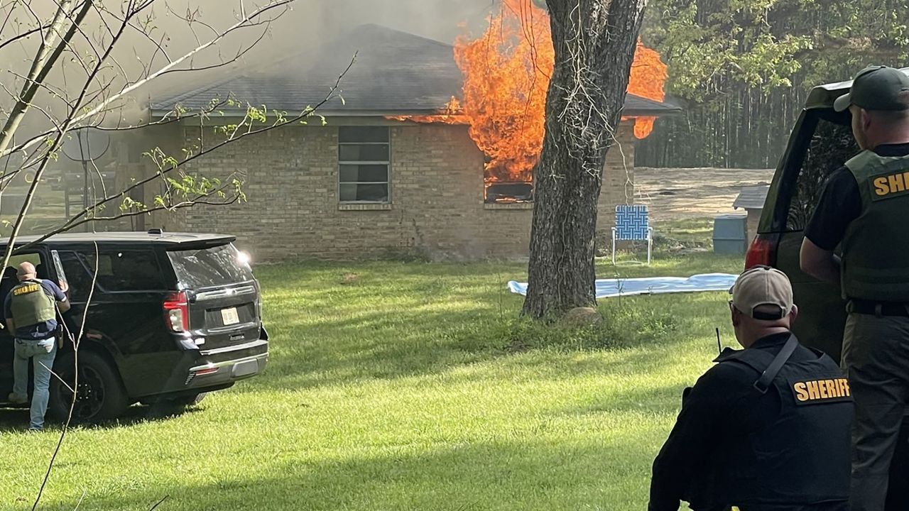 As authorities in Leake County, Mississippi, were responding to a home where they believed escapee Dylan Arrington was hiding and firing upon officers, the building caught fire. 