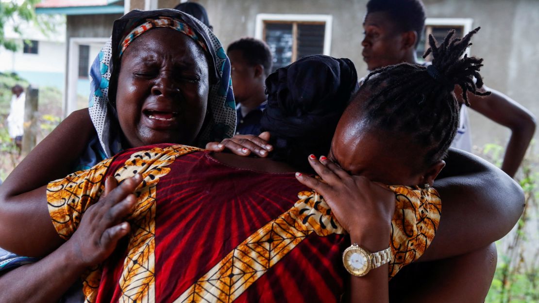 Naomi Kahindi, who lost her sister and her children,  mourns at the Malindi sub district hospital mortuary in Malindi, Kilifi county, Kenya. 