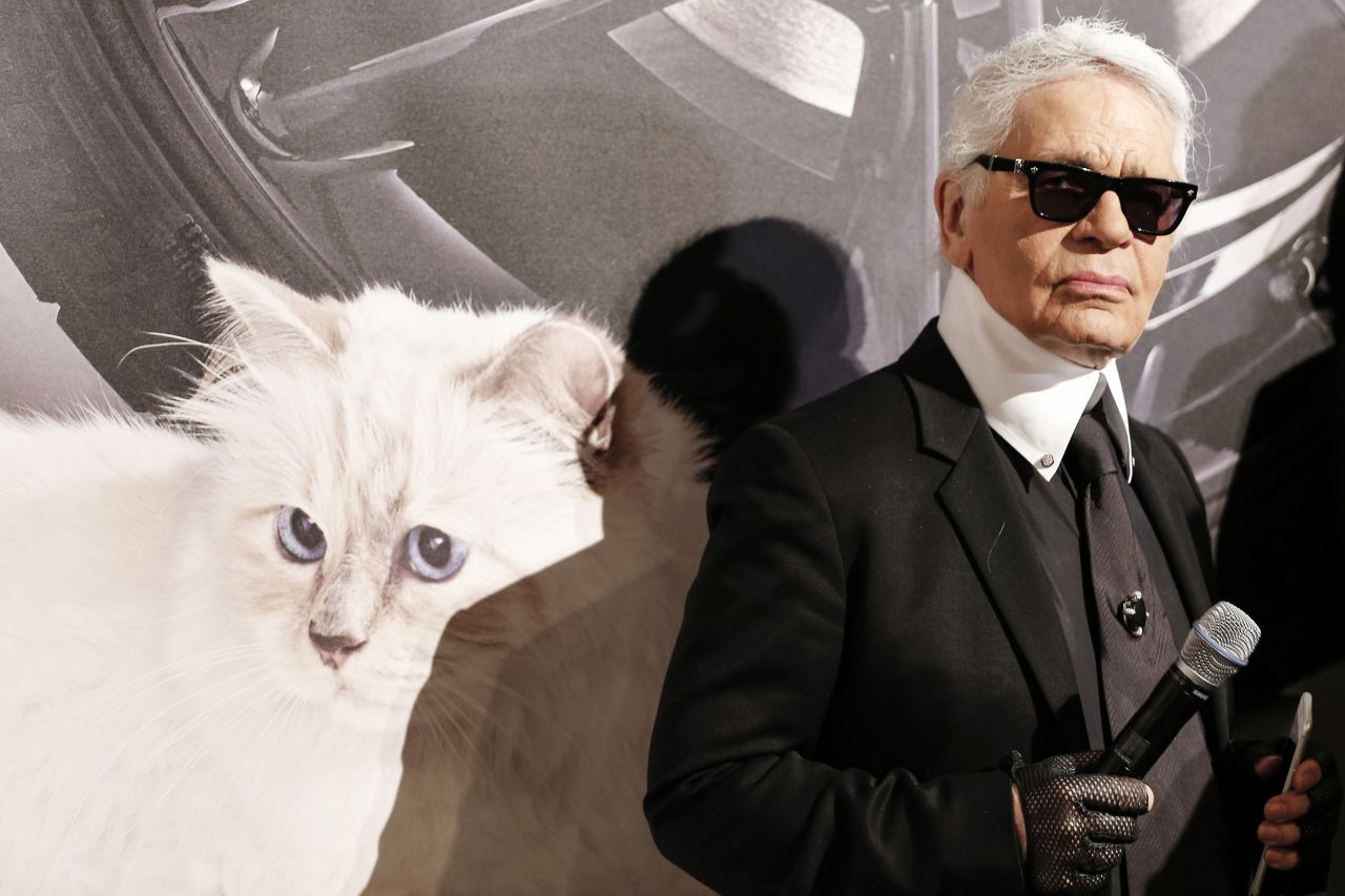 Lagerfeld with his cat and muse, Choupette, at an exhibition dedicated to his feline companion in 2015.