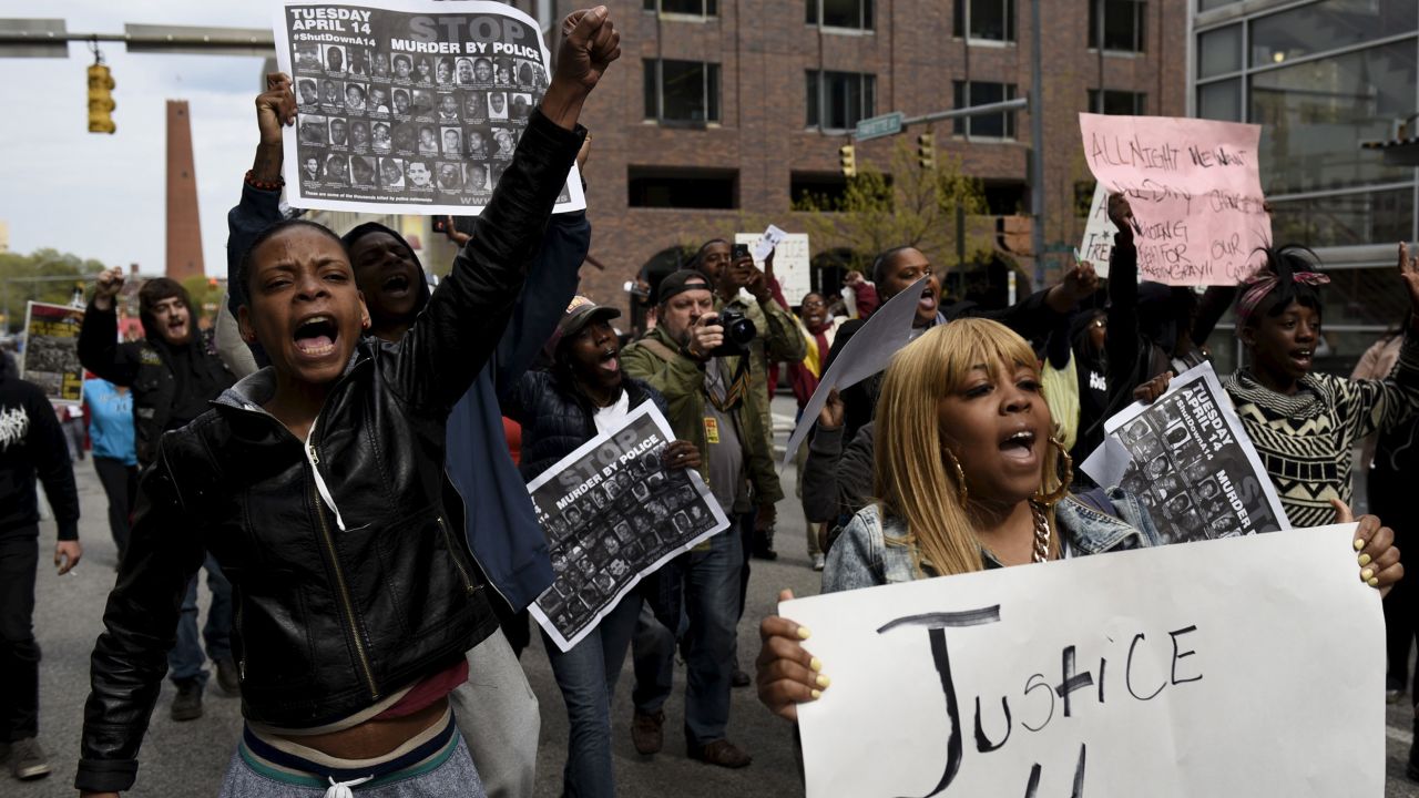 Demonstrators protest in Baltimore against the death of Freddie Gray, a Black man who died in police custody. Blake grew up in the same community where Gray was arrested and where the HBO series "The Wire" was set.
