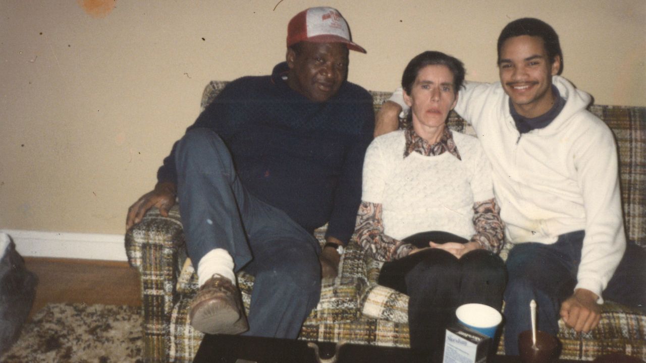 John Blake, right, as a young man with his mother and father. His parents defied social customs and faced public attacks when they started dating in the early 1960s, at a time when interracial marriage was illegal in much of the US.