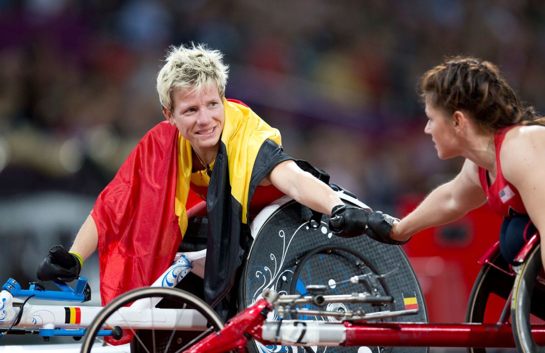 Vervoort fist bumps another competitor at the London 2012 Paralympics. 
