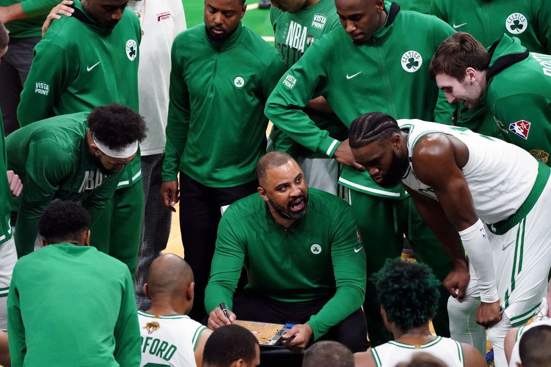 Udoka talks with Celtics players during a timeout against the Golden State Warriors last year. 