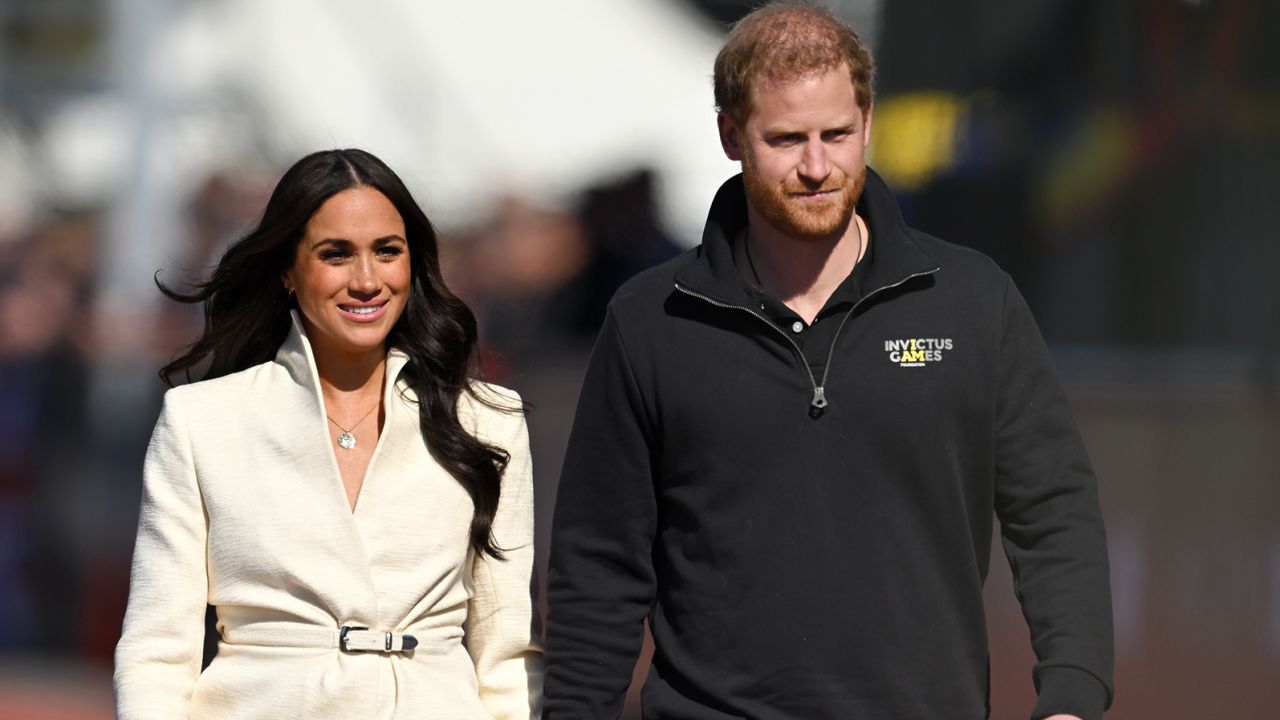 Prince Harry, Duke of Sussex and Meghan, Duchess of Sussex attend the athletics event during the Invictus Games at Zuiderpark in The Hague, Netherlands on April 17, 2022.