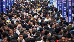People attend a job fair in China's southwestern city of Chongqing on April 11, 2023. 