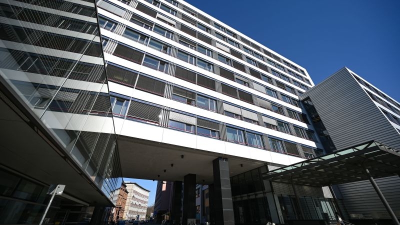NextImg:German landlord wins right to sunbathe naked despite complaints from tenants | CNN