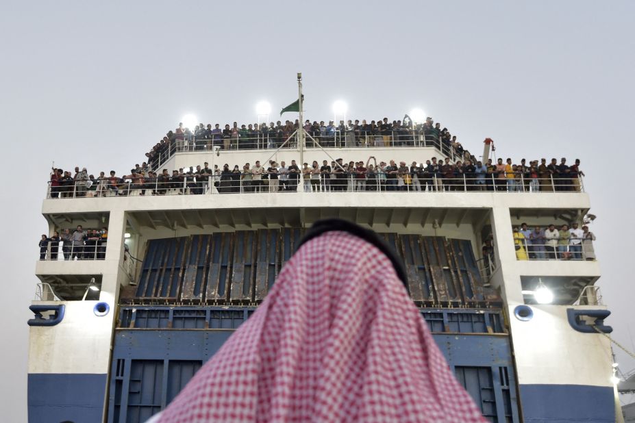 A boat carrying people from more than 50 countries arrives at the King Faisal Naval Base in Jeddah, Saudi Arabia, after they fled the violence in Sudan on Wednesday, April 26.