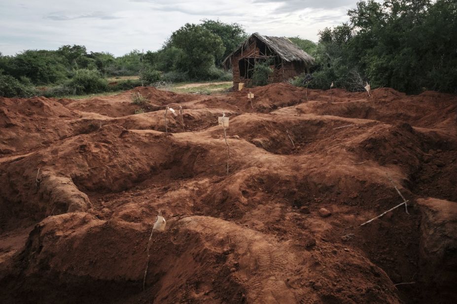 Holes are seen in Shakahola, Kenya, on Tuesday, April 25, after <a href="https://www.cnn.com/2023/04/24/africa/kenya-cult-starvation-deaths-intl/index.html" target="_blank">police exhumed dozens of bodies</a> from mass graves. The bodies have been linked to a religious cult whose followers allegedly starved themselves to get to heaven.