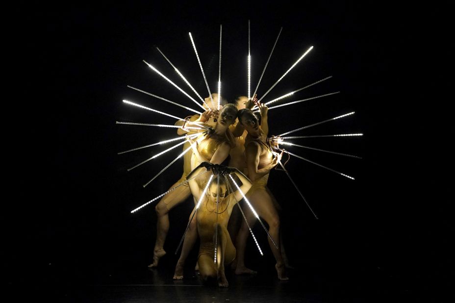 Momix dancers perform a scene from "Light Reigns" during a performance at the Queens Theatre in New York on Sunday, April 23. 