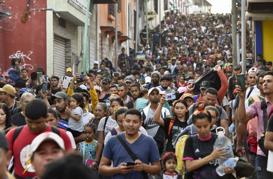 Migrants on their way to Mexico City start walking north from Tapachula, Mexico, on Sunday, April 23.