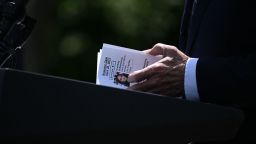 US President Joe Biden looks at a note card referencing a reporter and its question during a news conference with South Korean President Yoon Suk-yeol in the Rose Garden of the White House in Washington, DC, on April 26, 2023. (Photo by Brendan SMIALOWSKI / AFP) (Photo by BRENDAN SMIALOWSKI/AFP via Getty Images)