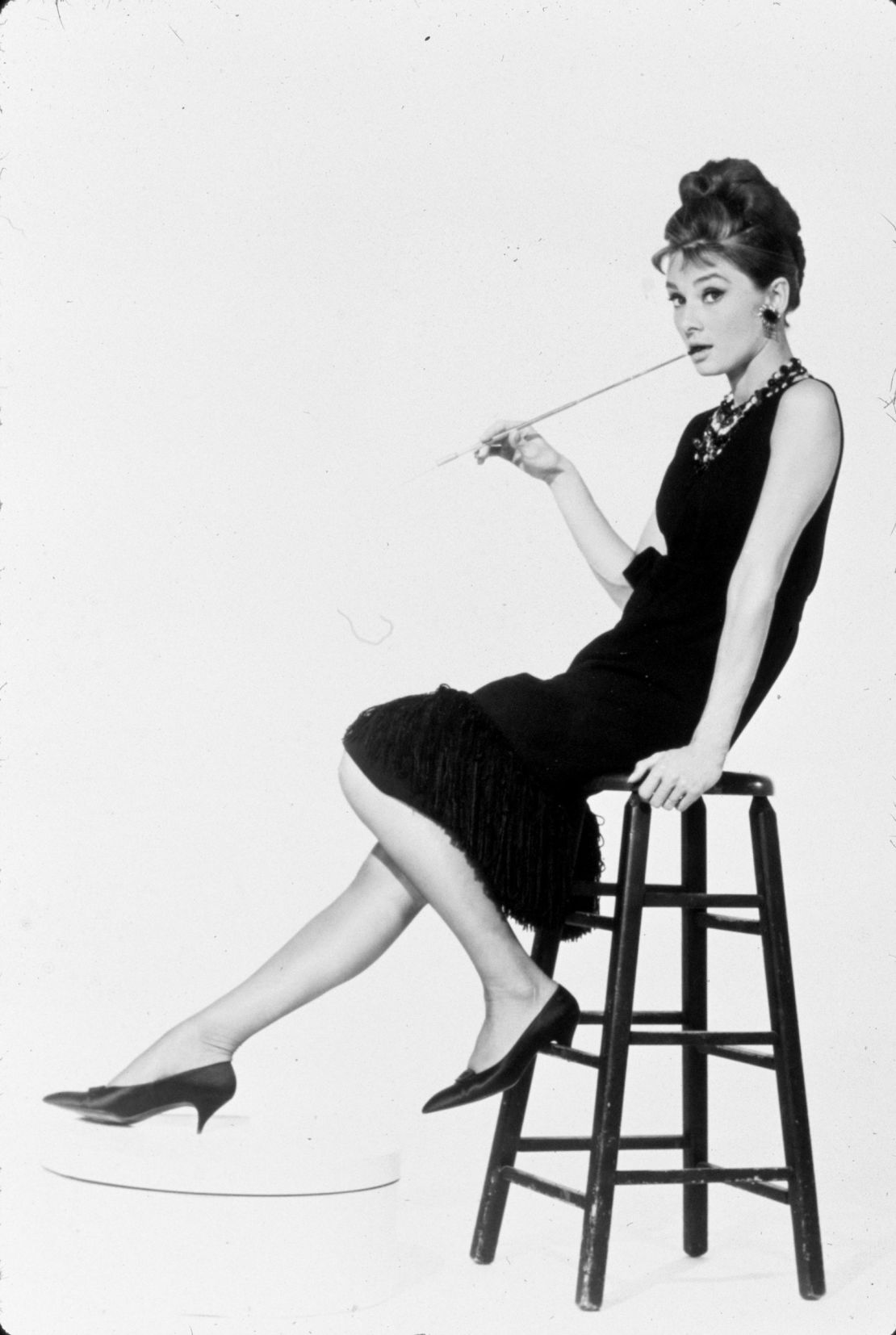 Hepburn's LBD in the 1961 movie cemented the garment in pop culture.