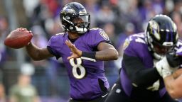 BALTIMORE, MARYLAND - NOVEMBER 07: Quarterback Lamar Jackson #8 of the Baltimore Ravens looks to pass against the Minnesota Vikings in overtime at M&T Bank Stadium on November 07, 2021 in Baltimore, Maryland. (Photo by Scott Taetsch/Getty Images)