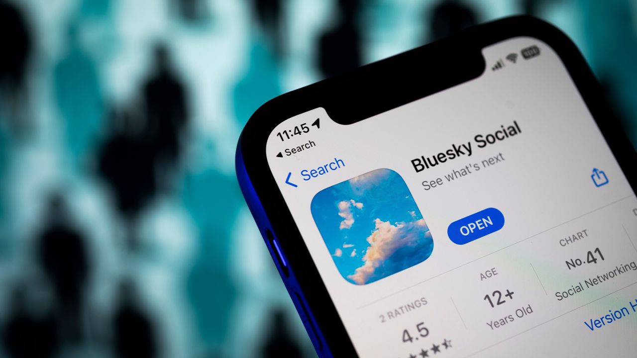 The Bluesky social media app logo is seen on a mobile device in April 2023. 