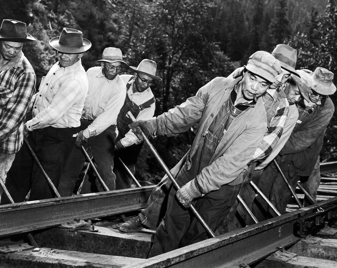 Chinese and Filipino workers lay track for the Burlington Railroad (formerly the Great Northern Railway) at Stevens Pass in Washington state in this undated photo. 