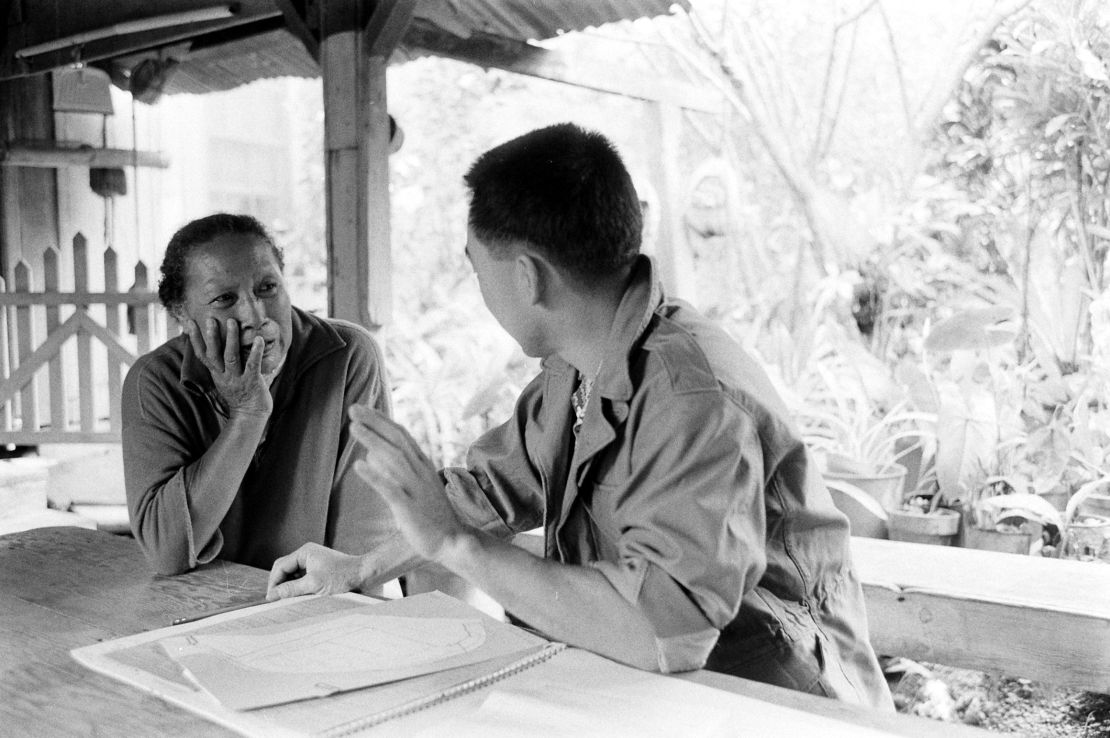 A census taker (right) interviews a resident in Honolulu, Hawaii, March 1960.