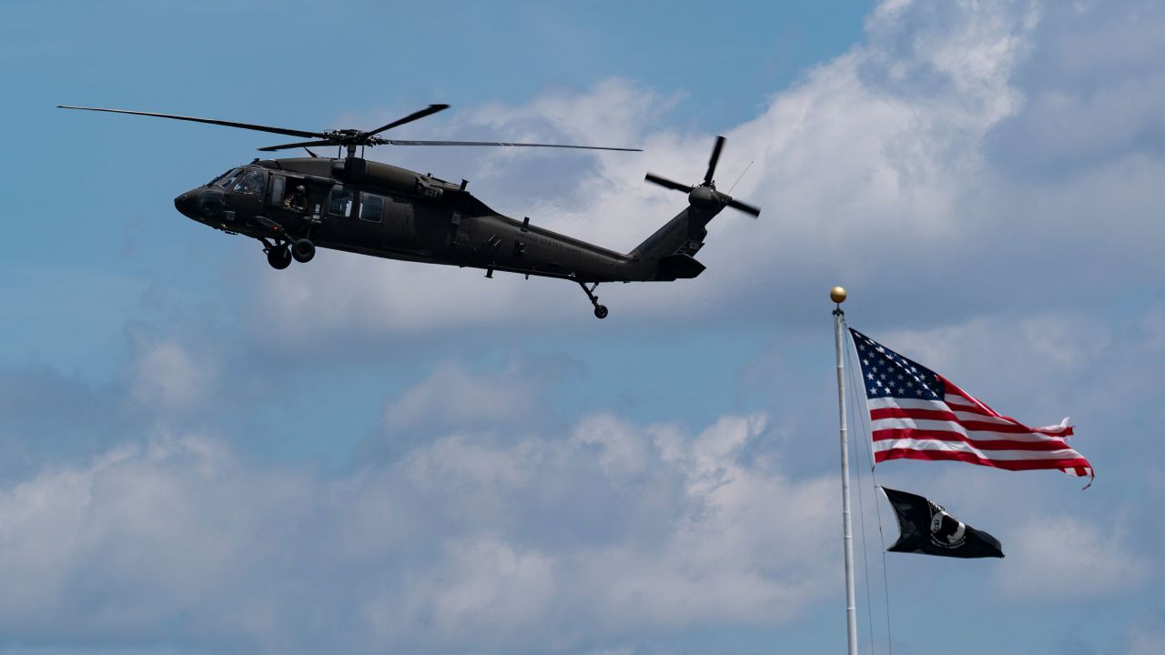 A UH-60 Blackhawk helicopter flies near the Pentagon, Thursday, May 19, 2022, in Washington. (AP Photo/Alex Brandon)