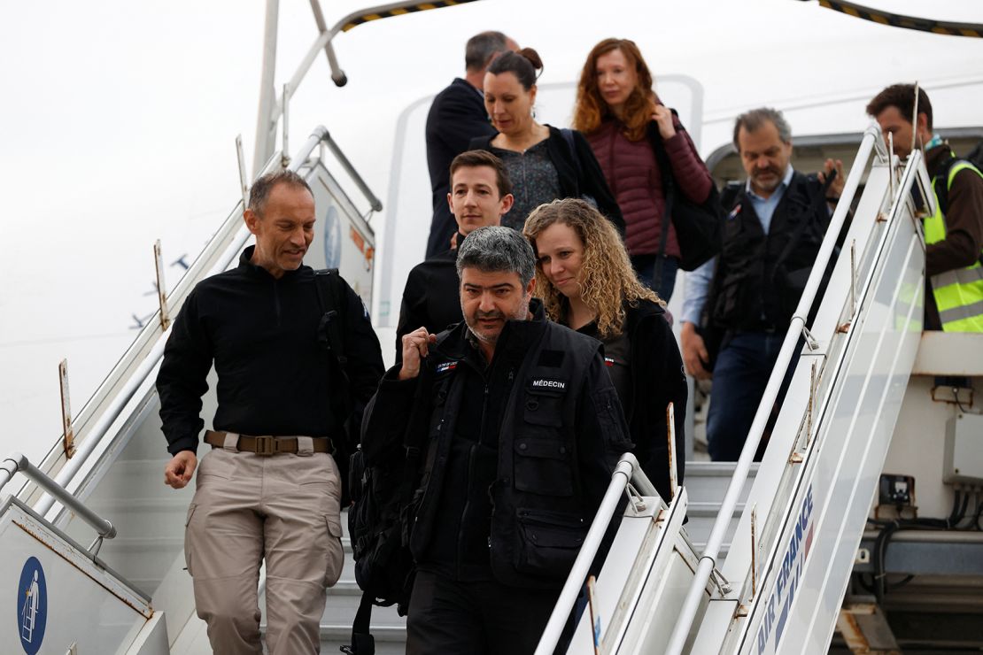 French nationals and other European citizens, who were evacuated from Sudan through Djibouti, arrive at the Paris-Charles de Gaulle airport in Roissy, France, on April 26, 2023. 