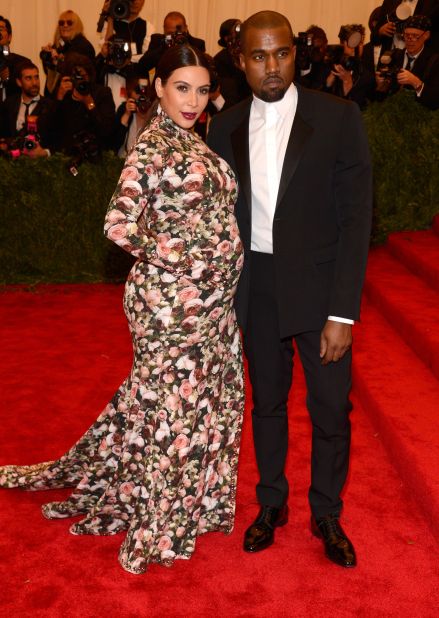 Kim Kardashian and Kanye West at the 2013 Met Gala to celebrate "Punk: Chaos to Couture.'' Kardashian's floral Givenchy gown, designed by Riccardo Tisci, proved a particularly polarizing (and meme-able) look.