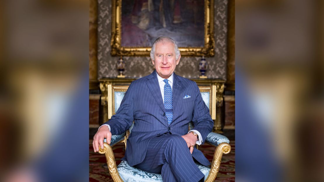 King Charles III poses for a photograph in the Blue Drawing Room at Buckingham Palace, London. 