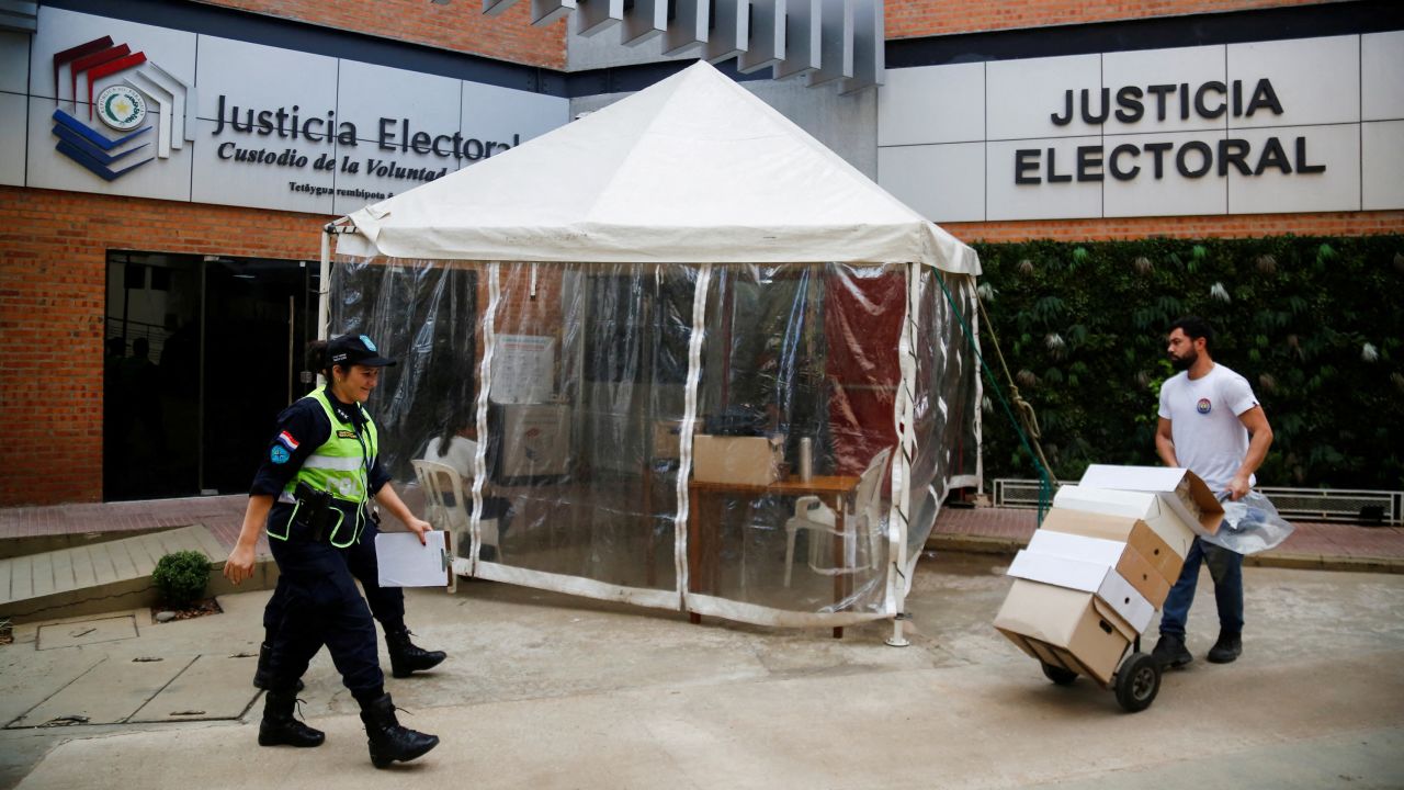 A staff member of Paraguay's Superior Court of Electoral Justice pushes a trolley with voting material.