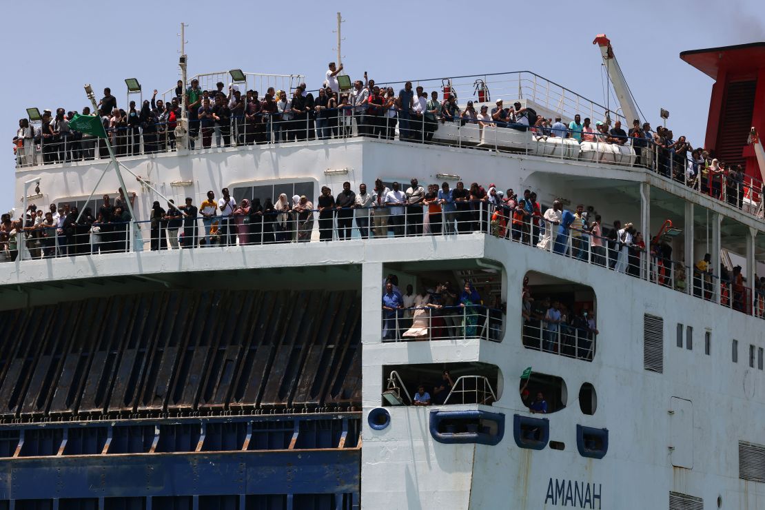 Evacuees travel across the Red Sea from Port Sudan to the Saudi King Faisal navy base in Jeddah, on Saturday. The UN's refugee agency warned over 800,000 people may flee as a result of the violence. 