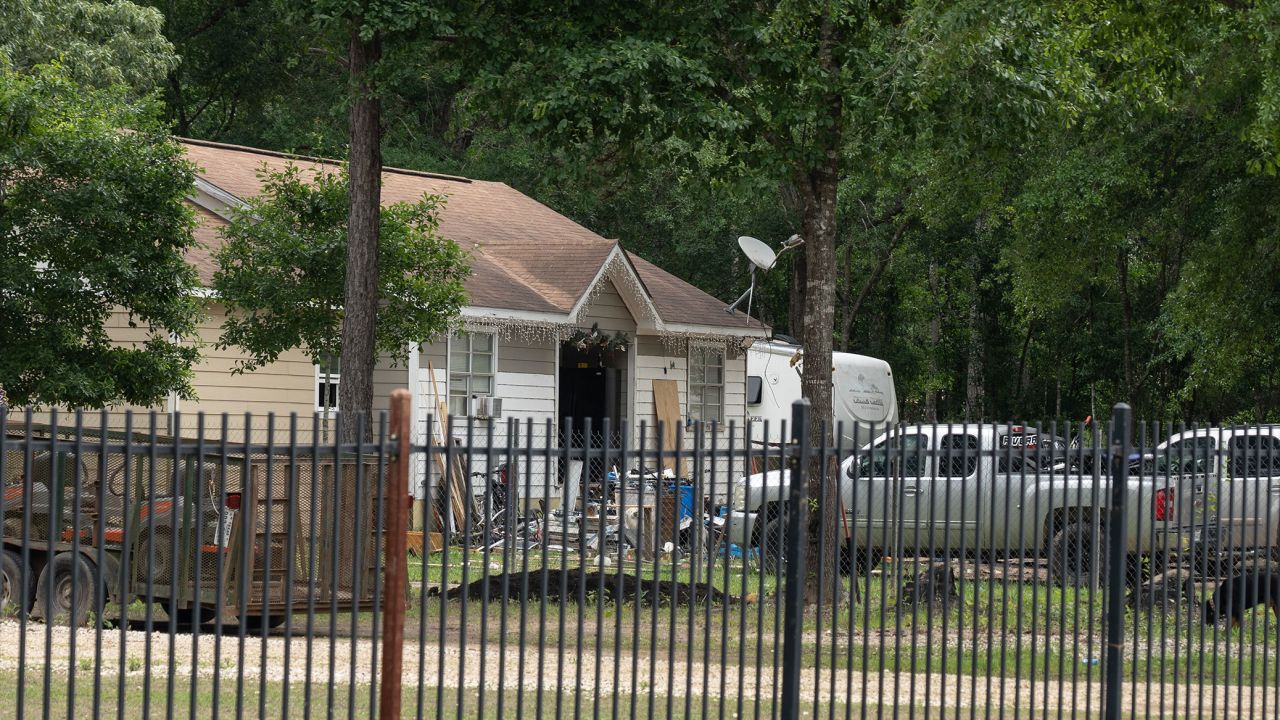  Exterior of a crime scene where five people, including an 8-year-old child, were killed after a shooting inside a home on Friday in Cleveland, Texas. 