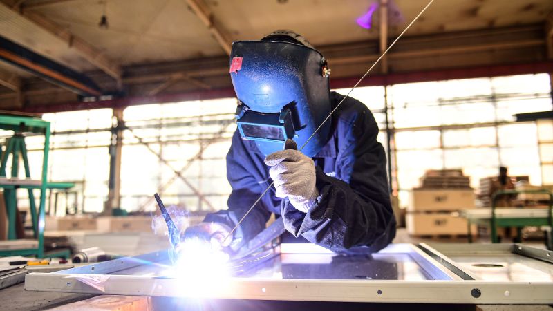 NextImg:China factory activity unexpectedly cools in April | CNN Business