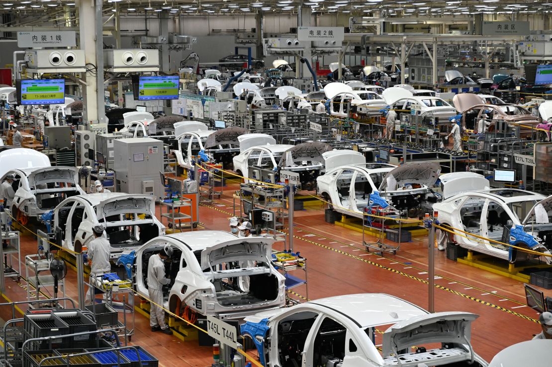 Employees working on an auto assembly line in Guangzhou. China's manufacturing activity unexpectedly shrank in April, according to official data.
