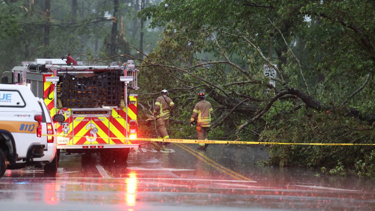 Trees were toppled and roads blocked Sunday following a tornado in Virginia Beach, Virginia.