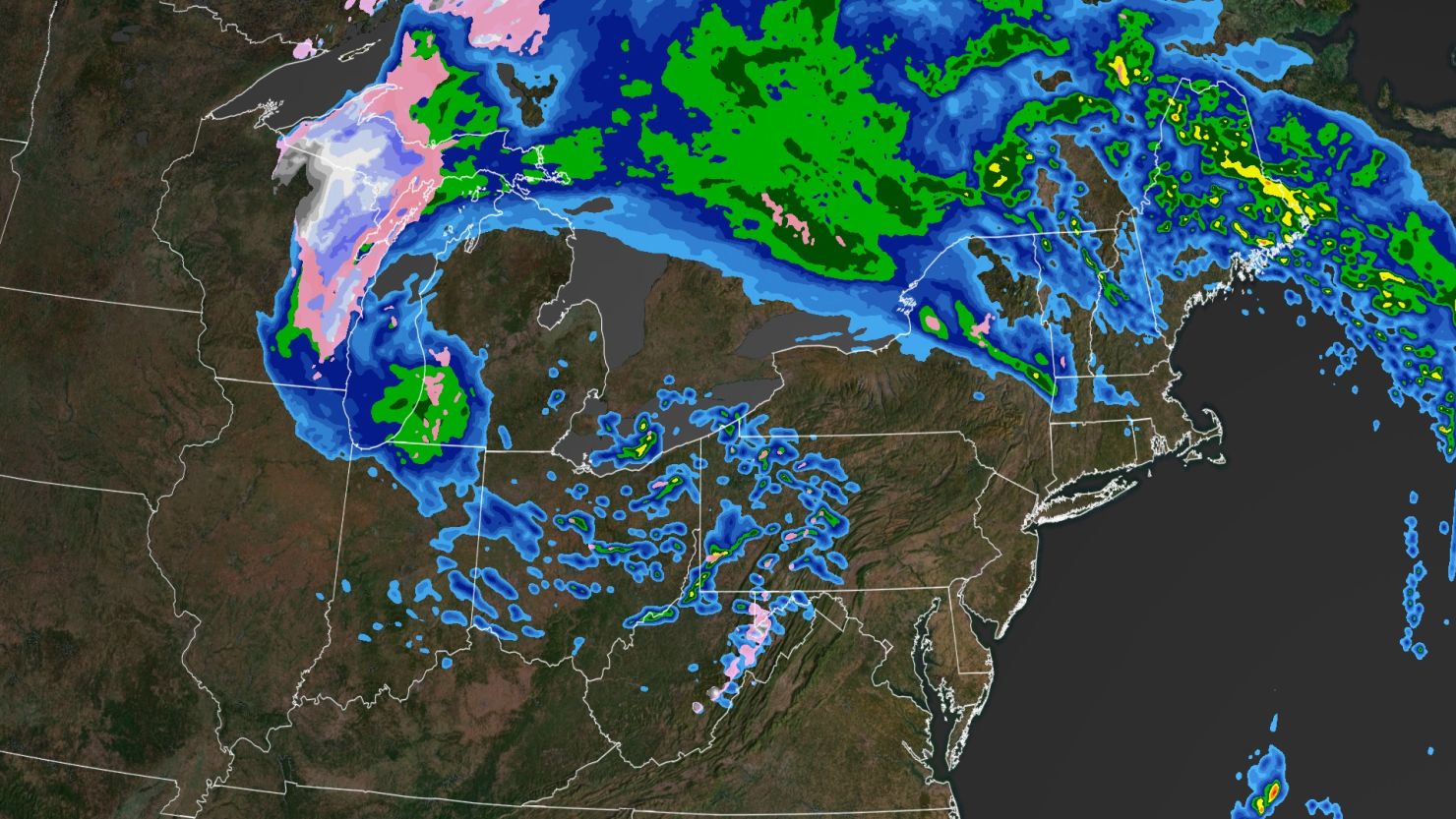 A slow moving system brings snow (white and purple), ice (pink), and rain (blue, green, and yellow) to the Great Lakes and Northeast through at least Tuesday.