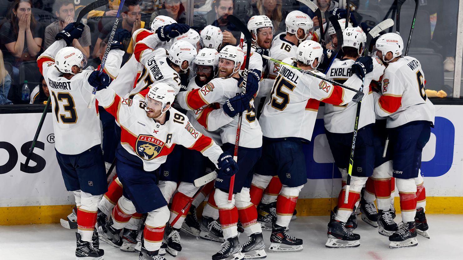 The Florida Panthers celebrate after defeating the Boston Bruins on a goal by Carter Verhaeghe in overtime during Game 7 of the NHL playoff series on Sunday, April 30, 2023, in Boston.