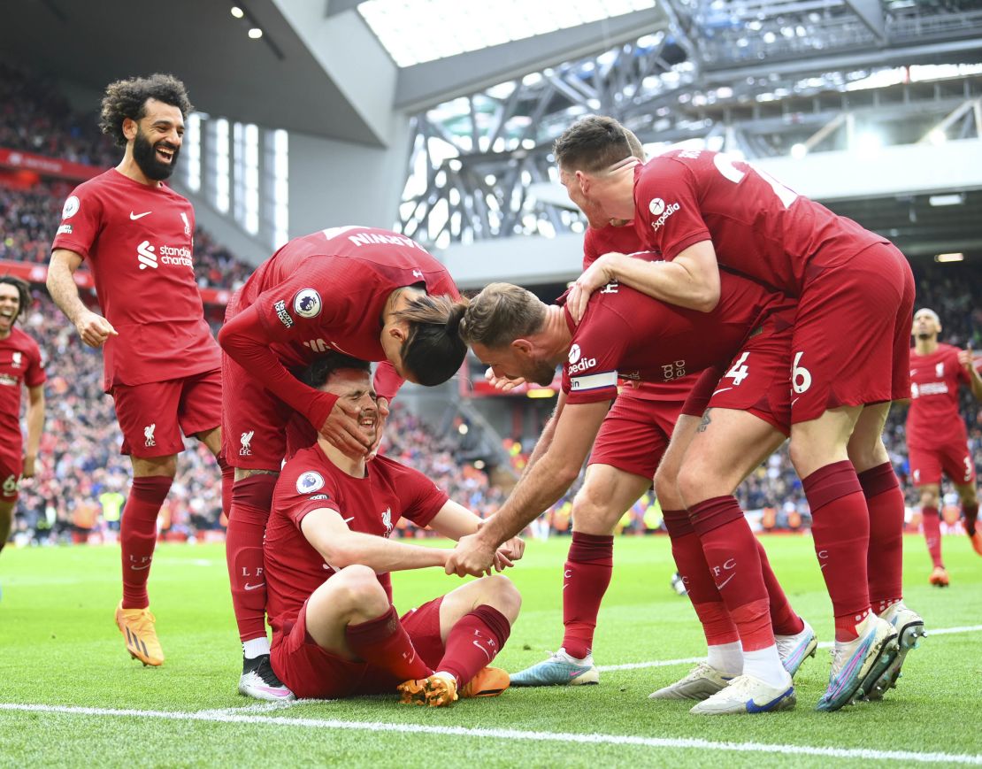 Jota (seated) came on as a substitute and scored Liverpool's winning goal against Tottenham.
