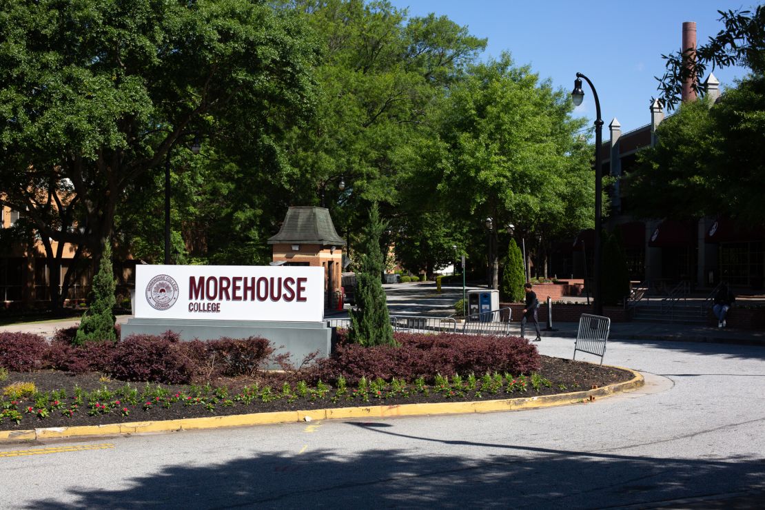 A person walks by the sign for Morehouse College in Atlanta on May 1.
