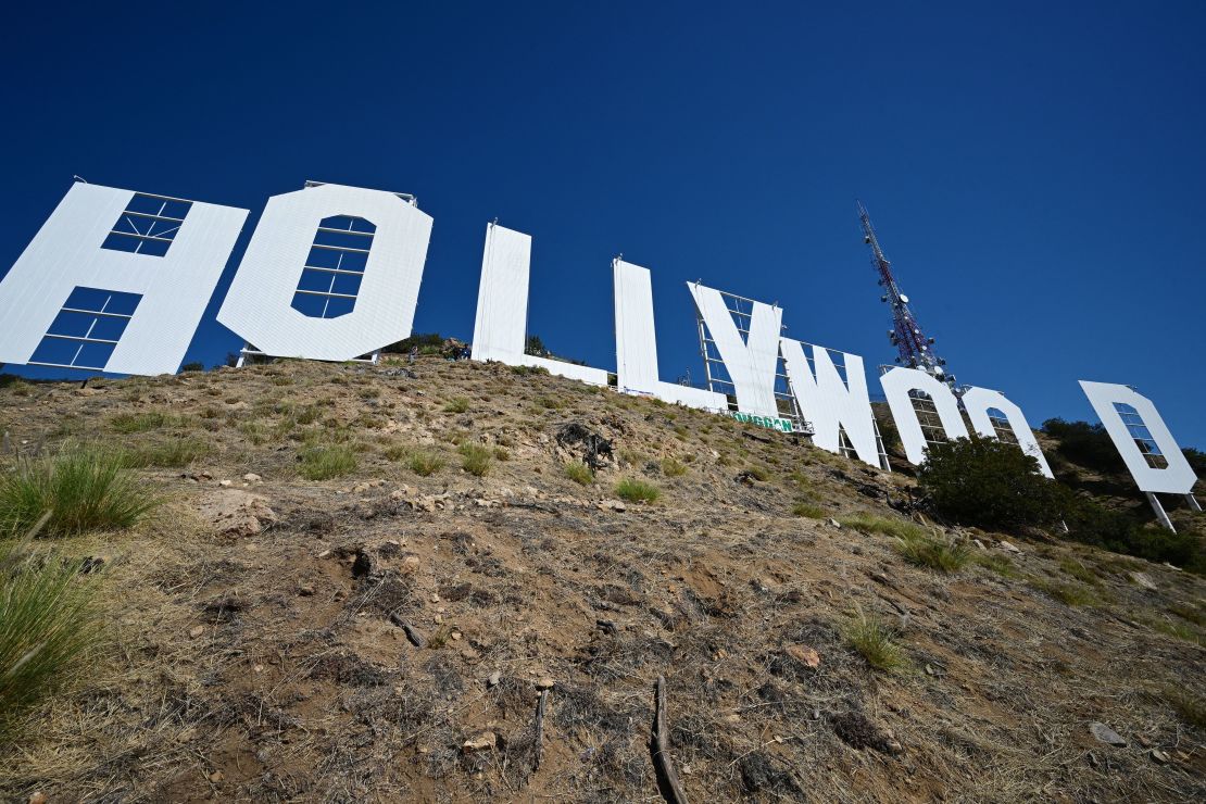 The Hollywood sign is seen as it is repainted in preparation for its 100th anniversary in 2023, in Hollywood on September 28, 2022. - A team of 10 painters will work eight weeks and use almost 400 gallons of paint as the iconic Tinsletown landmark gets a makeover ahead of it's 100th anniversary in 2023. (Photo by Robyn Beck / AFP) (Photo by ROBYN BECK/AFP via Getty Images)