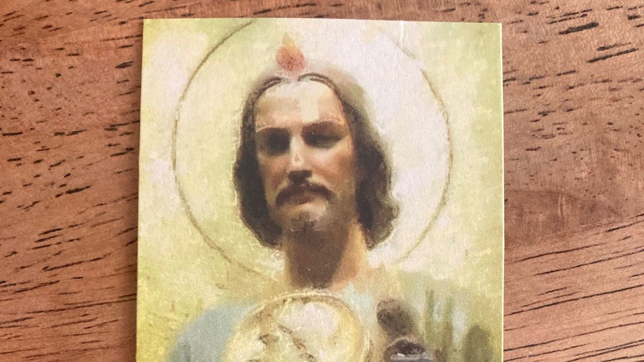 John Blake's mother was a devout Roman Catholic who relied on her faith to deal with misfortune. She always carried this image of St. Jude, the patron saint of hopeless causes.