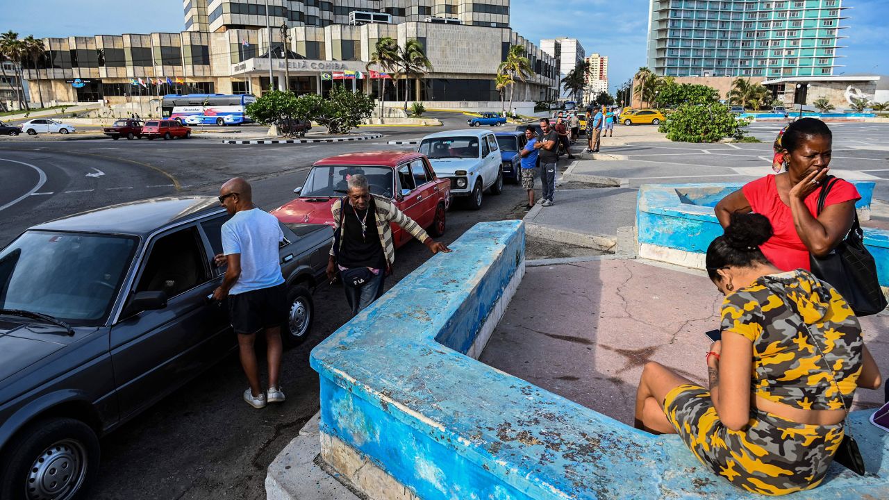 Drivers queue to get fuel near a gas station in Havana on April 24, 2023. - "This is hell!" exclaims Lazaro Diaz, a 59-year-old Cuban courier who has been in line for a day hoping to get gasoline, in the longest fuel shortage crisis that Havanans say they have experienced in years. (Photo by YAMIL LAGE / AFP) (Photo by YAMIL LAGE/AFP via Getty Images)