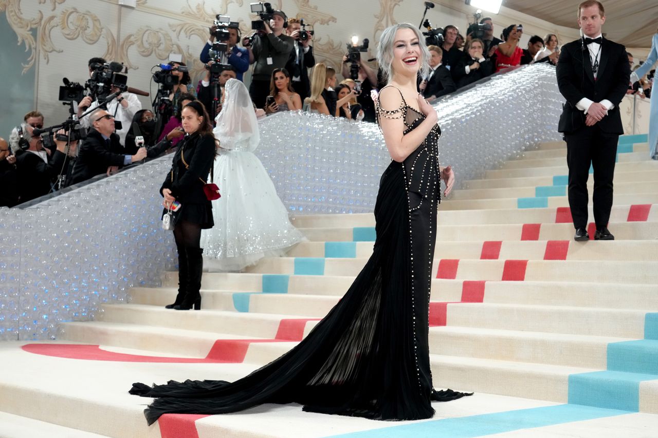 Musician Phoebe Bridgers channeled her best Chanel girl in a pearl-encrusted black gown by Tory Burch.
