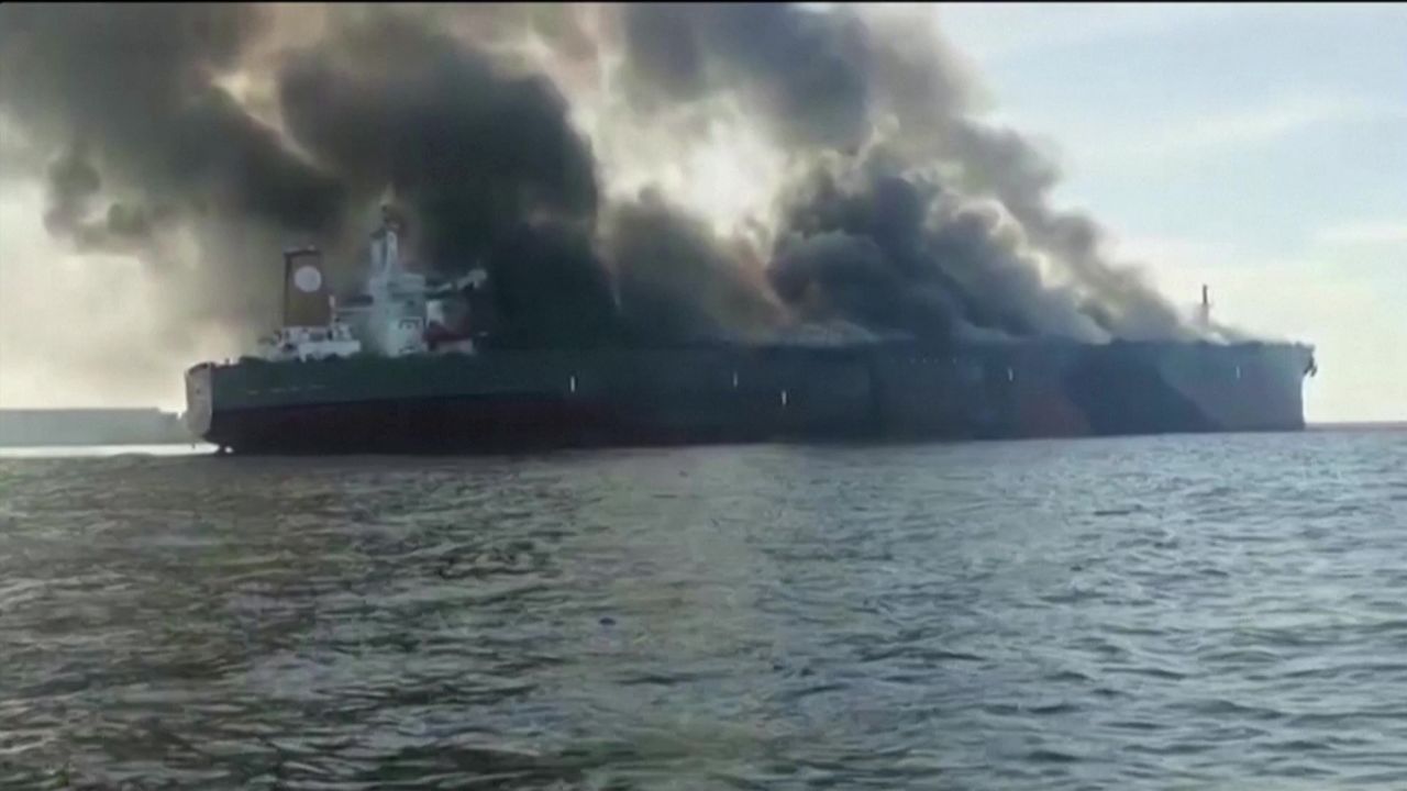 The oil tanker caught fire in waters off the coast of southern Malaysia on Monday, according to local authorities.