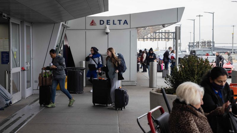 NextImg:DHS to lift Covid vaccine requirement for non-US travelers | CNN