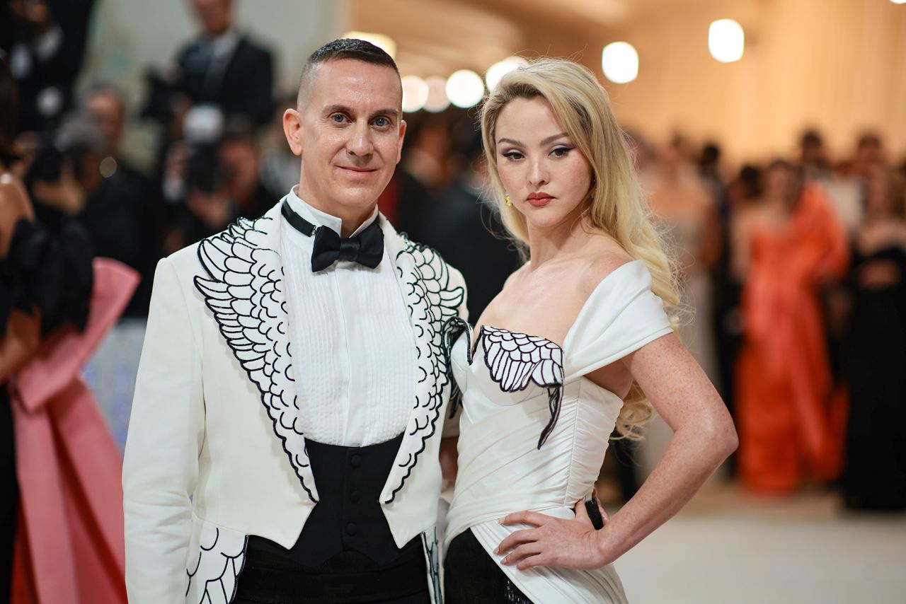 Jeremy Scott dressed Y2K Chanel muse Devon Aoki in an ethereal winged look that matched Scott's lapels. Both are from Scott's eponymous fashion house.