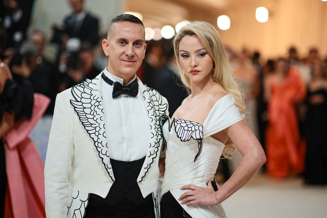 Jeremy Scott dressed Y2K Chanel muse Devon Aoki in an ethereal winged look that matched Scott's lapels. Both are from Scott's eponymous fashion house.
