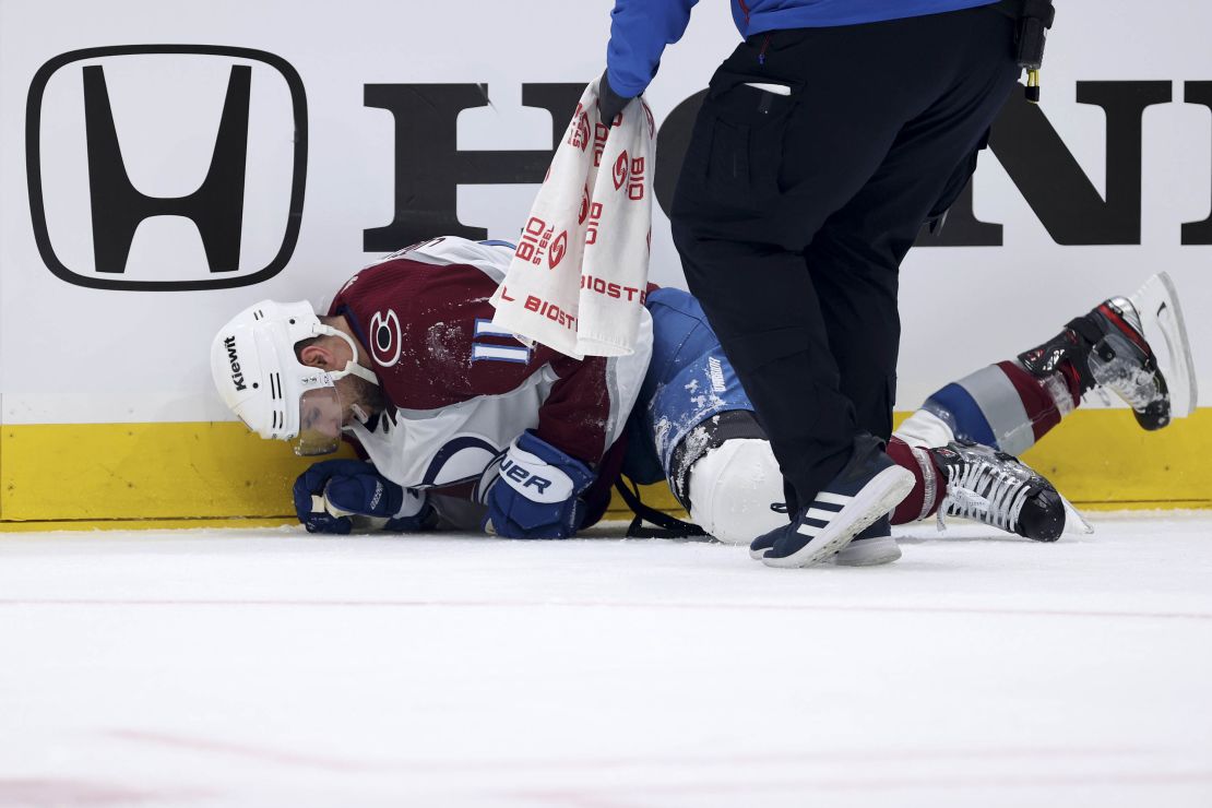 Cogliano is tended to by medical staff during Game 6 against the Seattle Kraken.