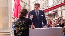 climate activist glue podium switzerland contd lon orig na