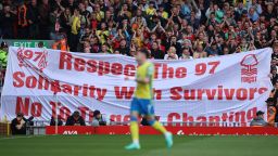 Soccer Football - Premier League - Liverpool v Nottingham Forest - Anfield, Liverpool, Britain - April 22, 2023
Nottingham Forest fans hold up a banner in memory of the 97 victims of the Hillsborough disaster REUTERS/Phil Noble