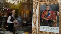A cafe displays a poster to celebrate the coronation of Britain's King Charles III in London, Friday, April 28, 2023. The Coronation will take place at Westminster Abbey on Saturday May 6. 